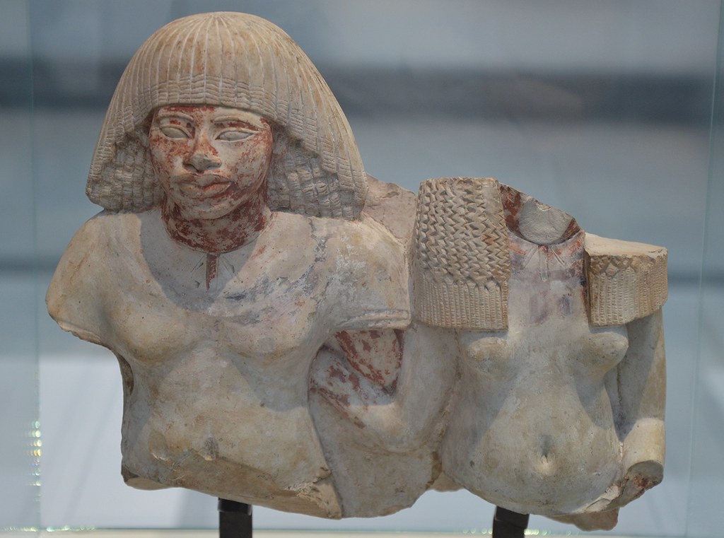 Fragment of a painted limestone statue of a deceased coupl… Flickr