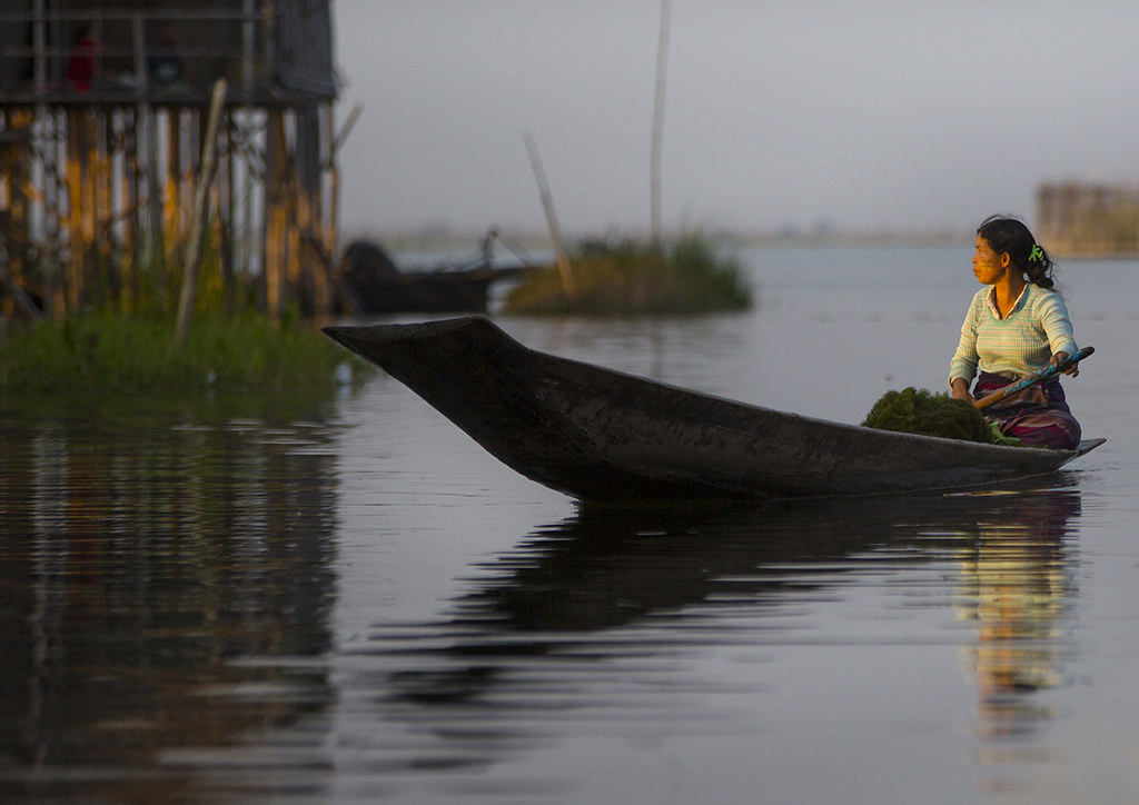 Woman Rowing In A Boat, Inle Lake, Myanmar © Eric Flickr