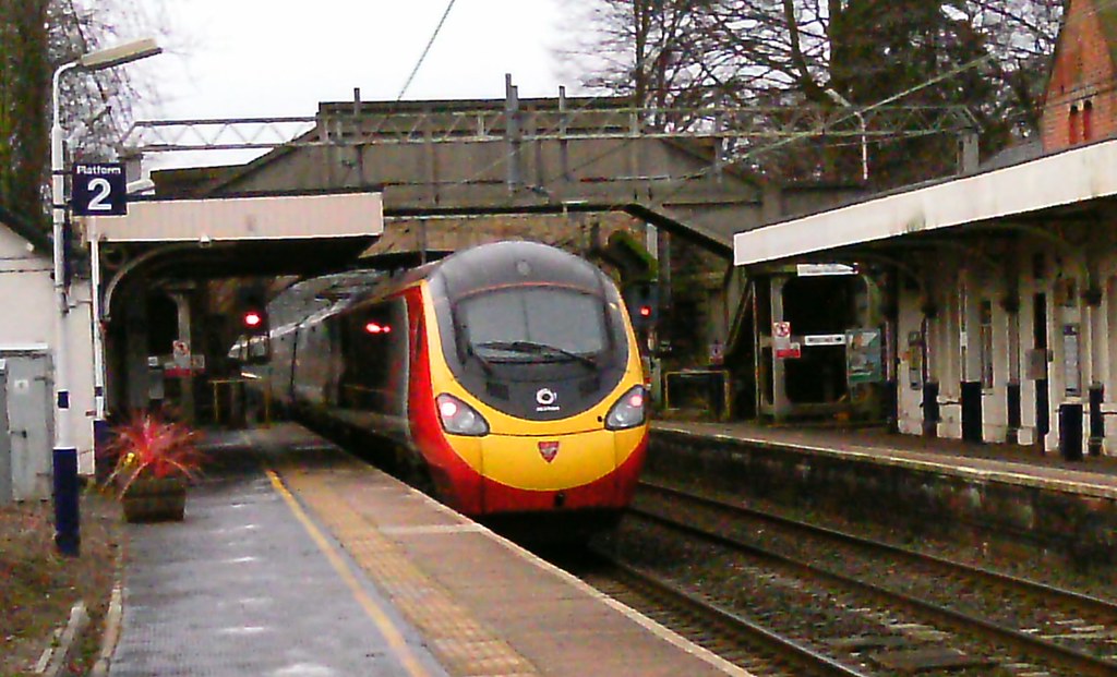 A class 390 emu passing through Alderley Edge with train 1… Flickr