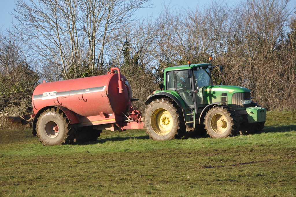 John Deere 7530 Tractor with a Hispec 2000 Vacuum Slurry Tanker a