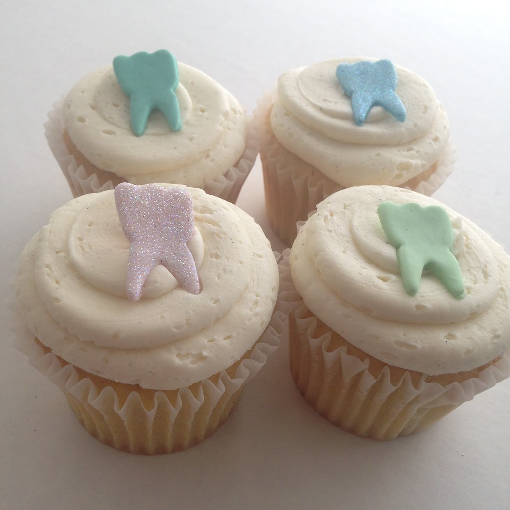 Tooth cupcakes (3500) Fondant tooth cut outs placed on van… Flickr