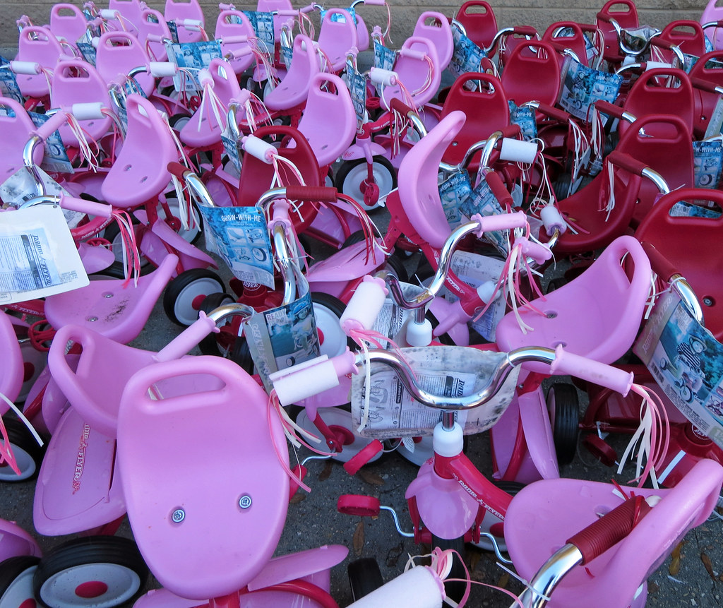 Corral of pink and red tricycles At the Walmart in Covingt… Flickr