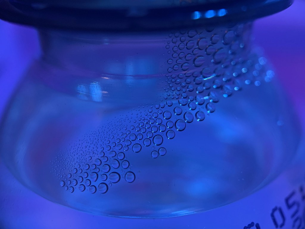 Speckled abstract Condensation inside a water bottle in th… Flickr