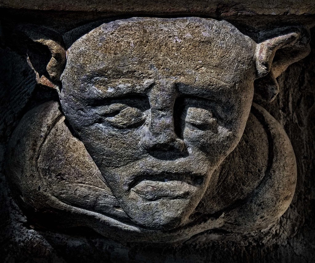 Grotesque Gothic stone figure. Interior of Basilique Notre… Flickr