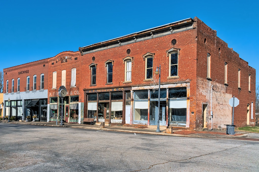 On The Courtland Square A row of empty buildings on the to… Flickr