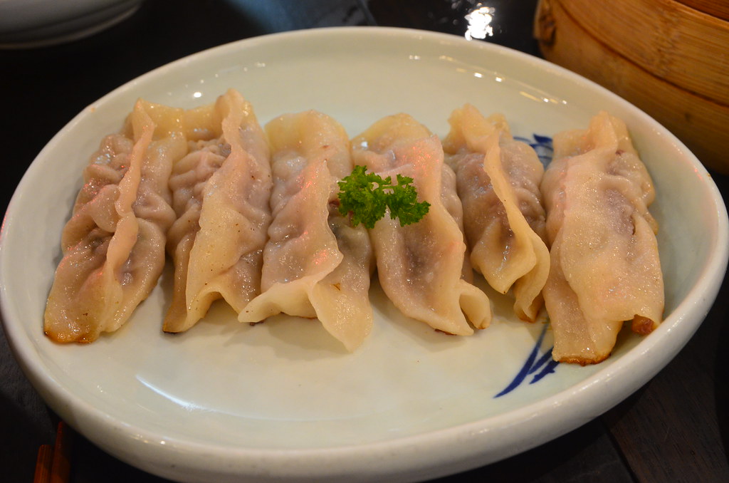 Panfried beef and coriander dumplings AUD8.80 Shanghai Red