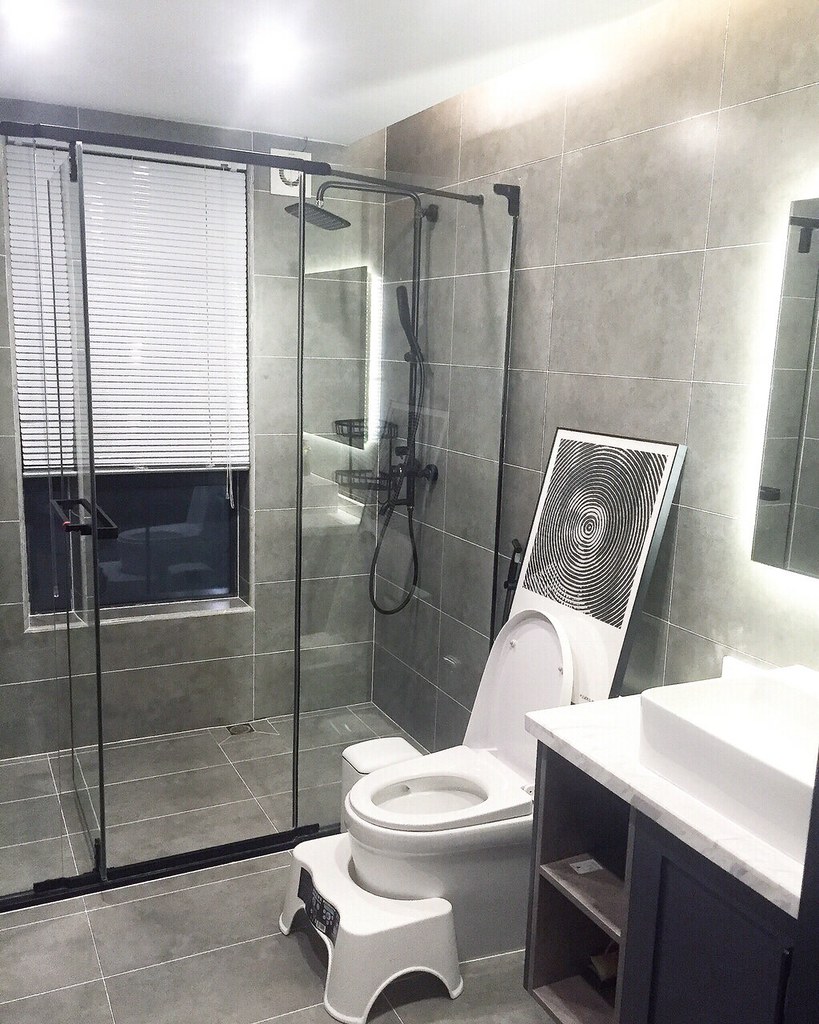 ceramic toilet, plumbing fixture in a tiled bathroom Flickr