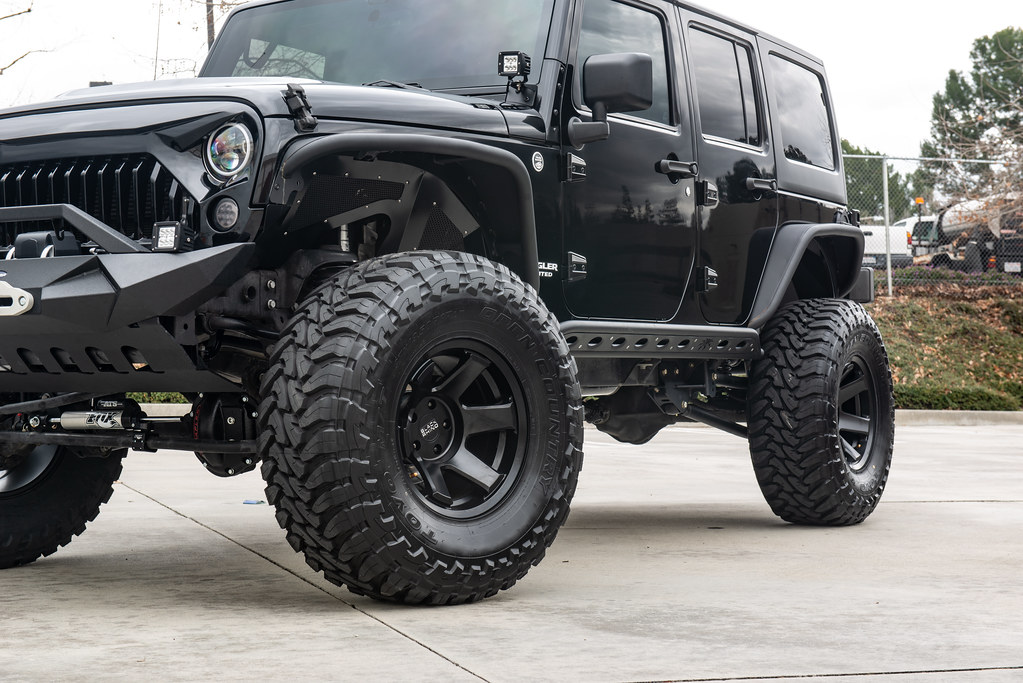 The Shop OC Jeep Wrangler JKU on Black Rhino Raze super deep concave