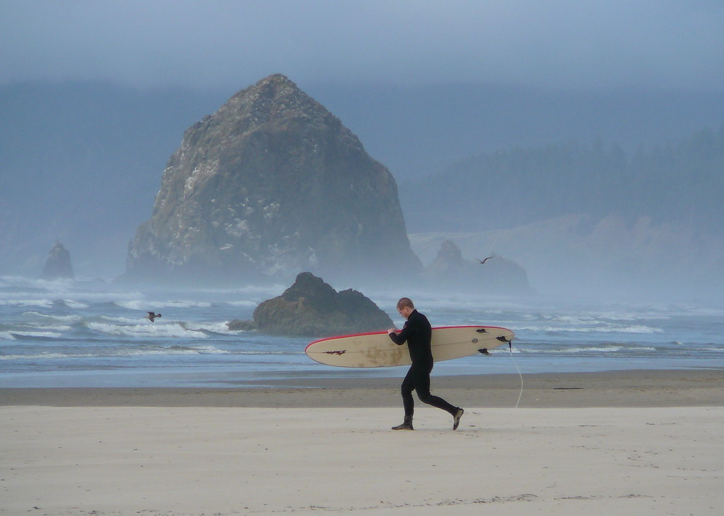 Surfer on Cannon Beach A better shot of the same surfer is… Flickr