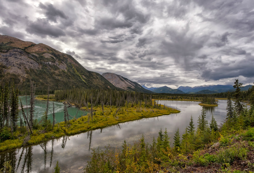BC Landscape The Toad River flows by a backwater lake unde… Flickr