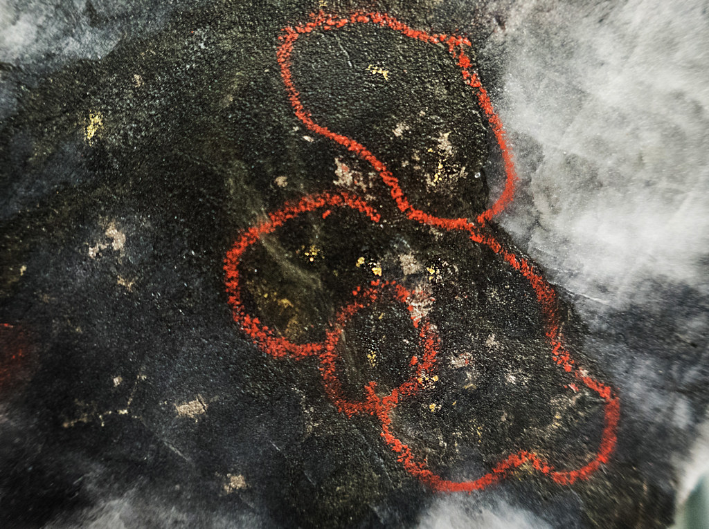 Yellow flakes of visible gold in core (ringed) Sprott Global Research