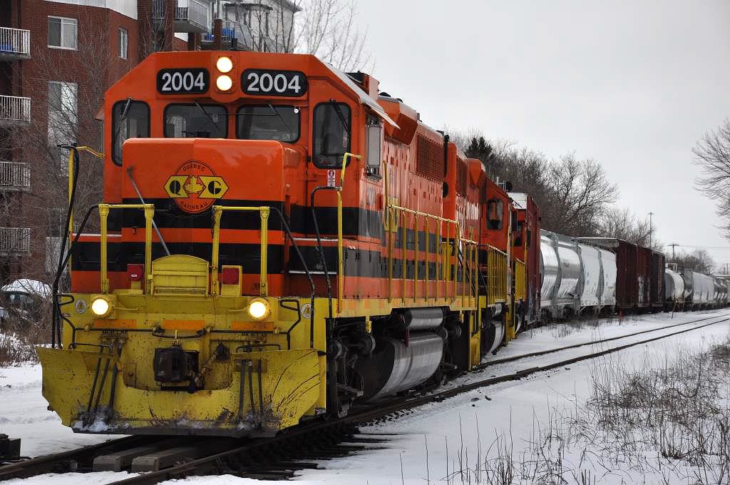 QG SainteTherese,QC Transfer exits the siding after meet.… Paul