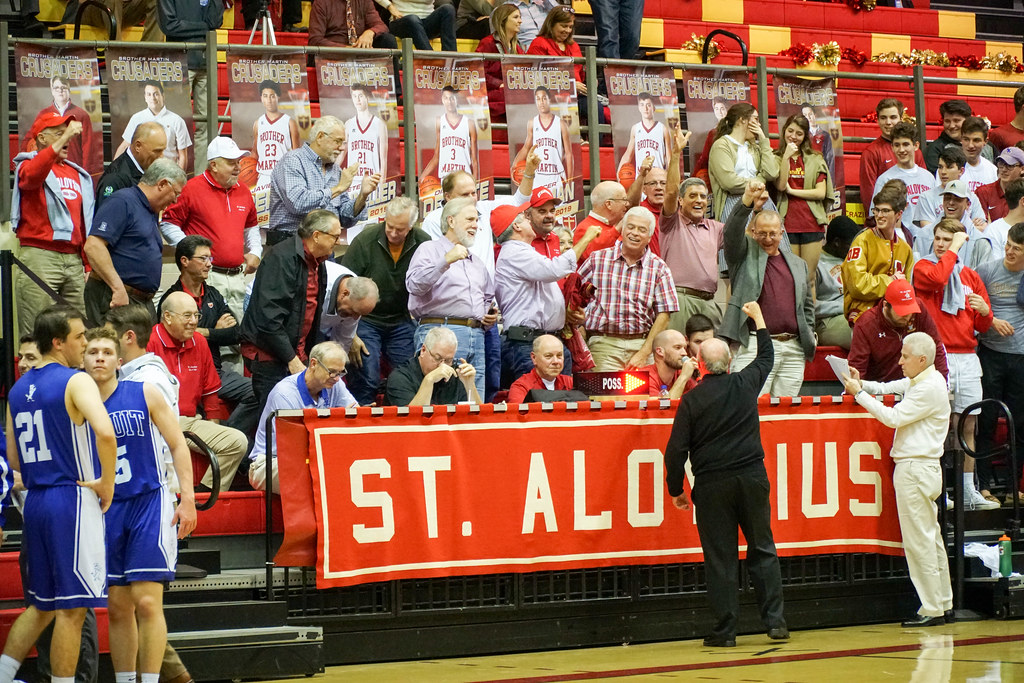 Basketball Wins Huge Upset over Jesuit on St. Aloysius Throwback Night