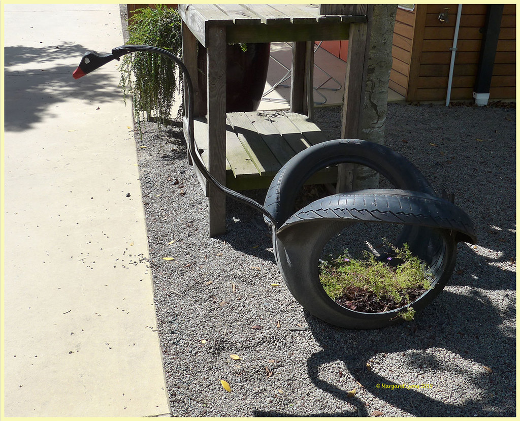 Plant pots from recycled tyres (1) margaretpaul Flickr
