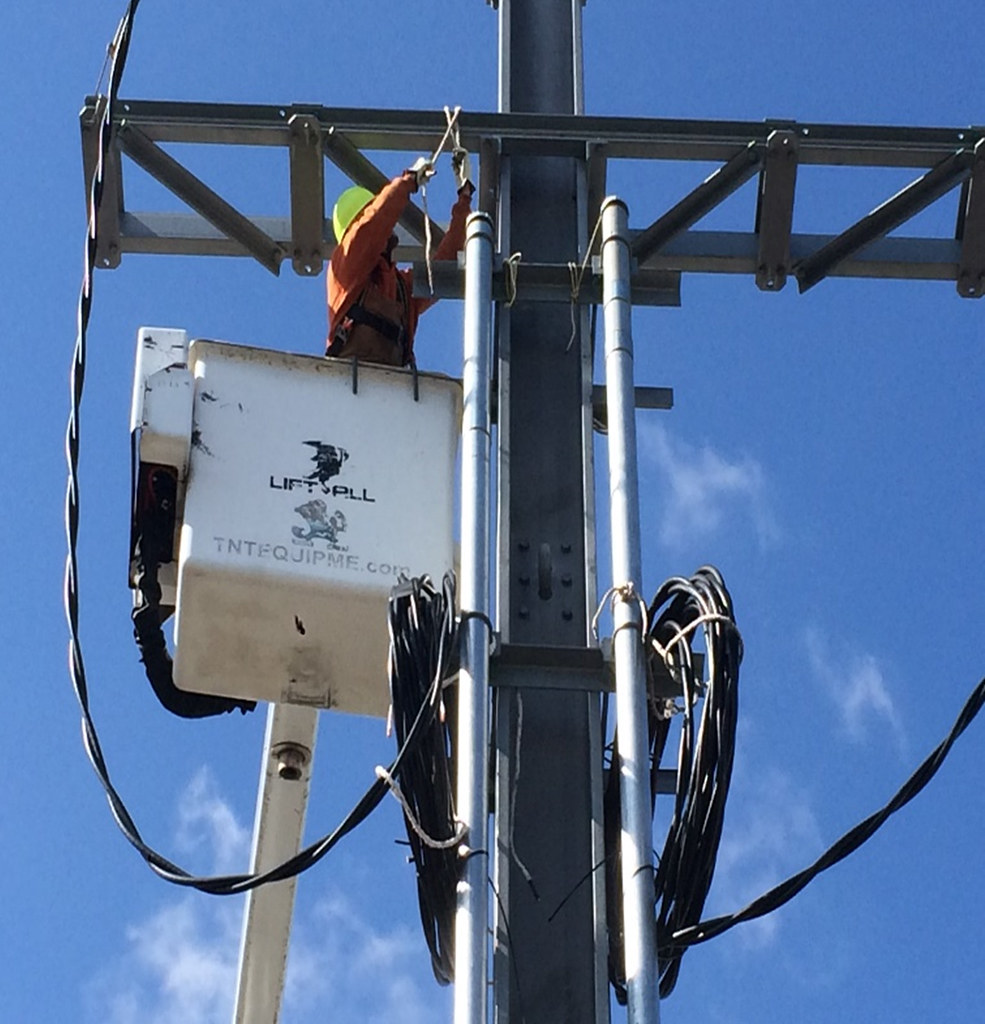 Preparation to pull cable through conduit for Signal Power… Flickr