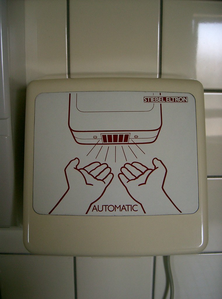 Hand dryer Some old school hand dryer found in a factory b… Flickr