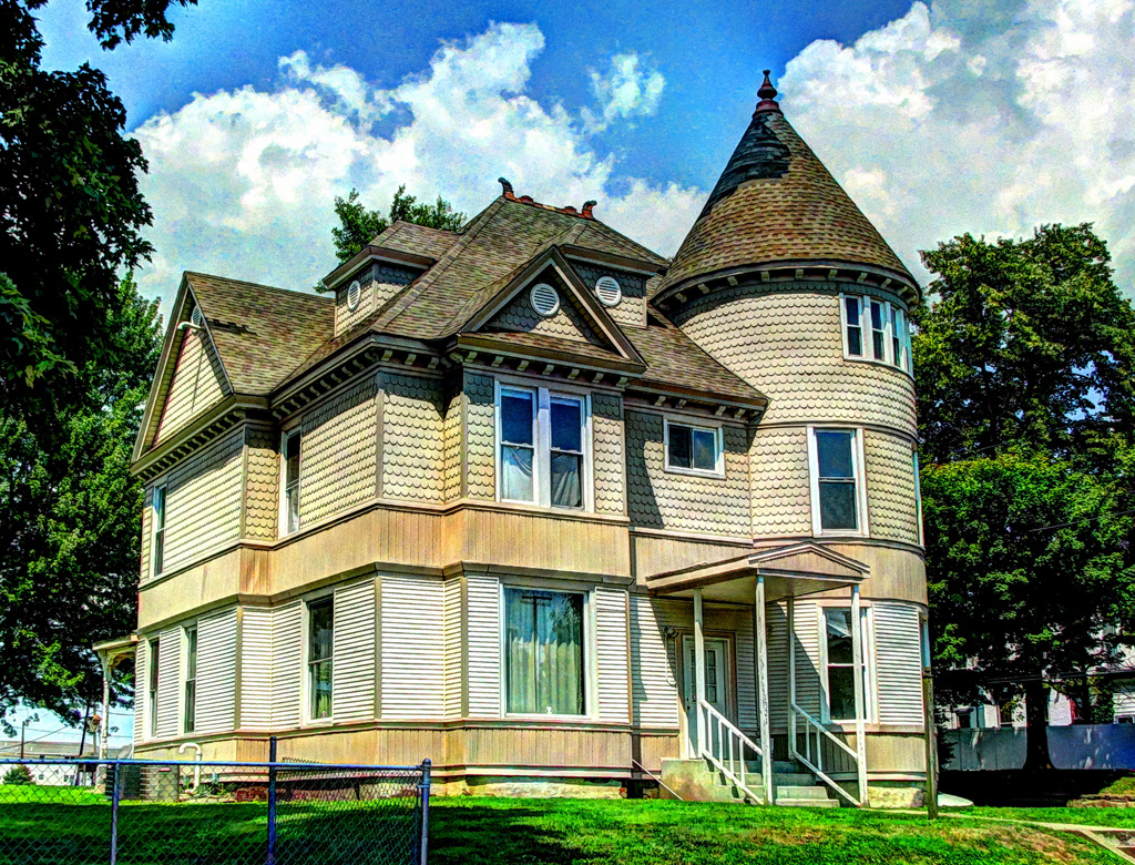 House with a tower I saw this interesting house while sear… Flickr