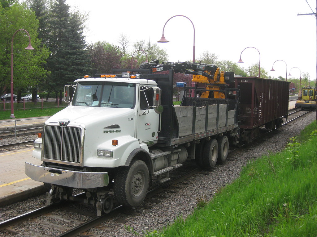 Big CP truck & Herzog ballast car Mtl. West Michael Berry Flickr