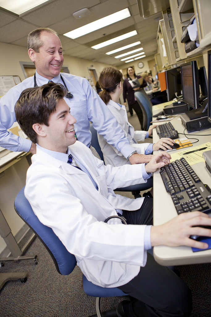 Doctors and residents working with patients at the JFK clinic in St