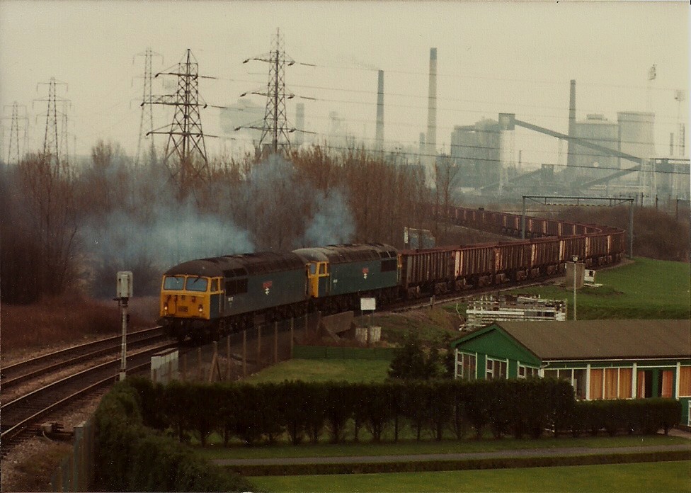 Llanwern Ore Empties With the steel works in the backgroun… Flickr