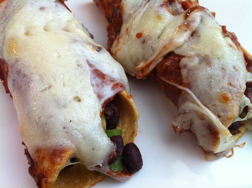 Veggie Enchiladas zucchini, homemade sauce, asiago fresco htomren