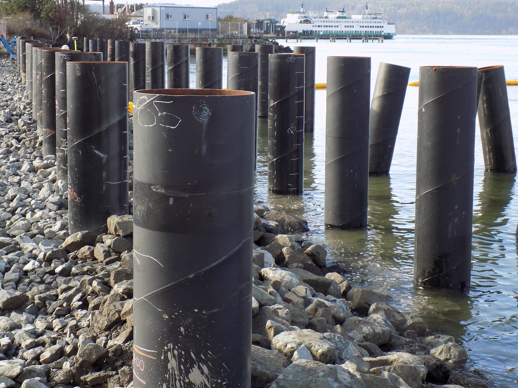 Rows of steel support piles along the shoreline Crews inst… Flickr