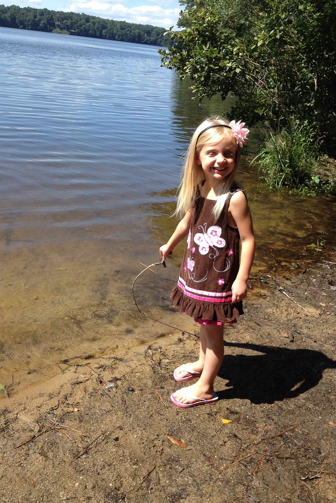 Playing at Lake Benson Park She was "fishing" at the lake.… Flickr