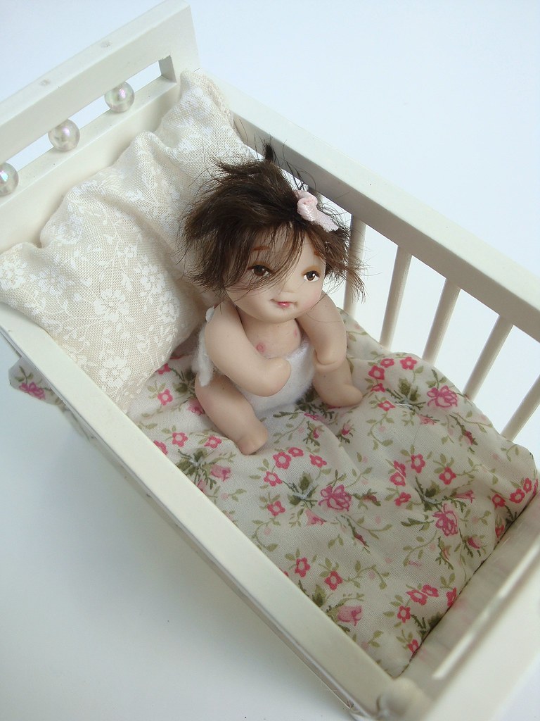Little baby doll in crib My newest baby doll, her head can… Flickr