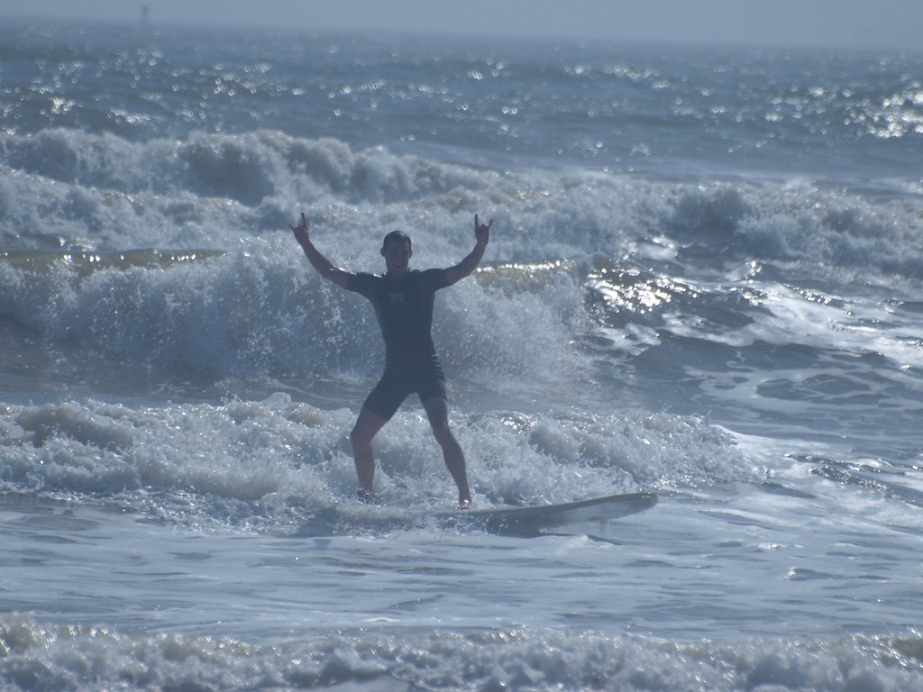 Surfside Beach Texas Surfers Surfing in the cold low waves… Flickr