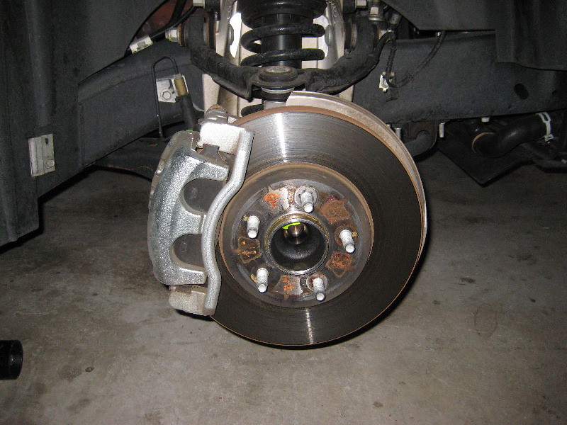 2011 Ford Crown Victoria LX Front Brake Caliper, Bracket, Pads and