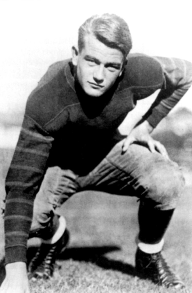 John Wayne; uscfootball 1920s John Irving Flickr