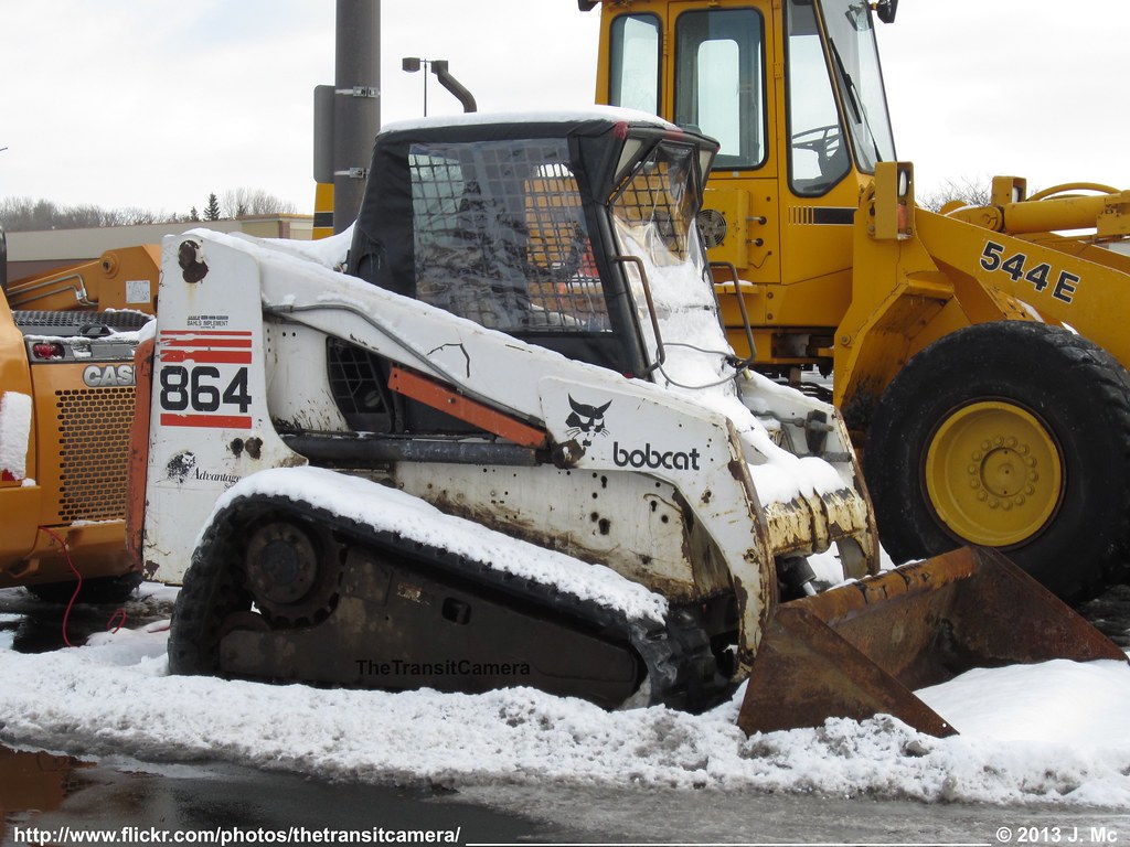 Bobcat 864 Skidloader Snow removal equipment parked in the… Flickr