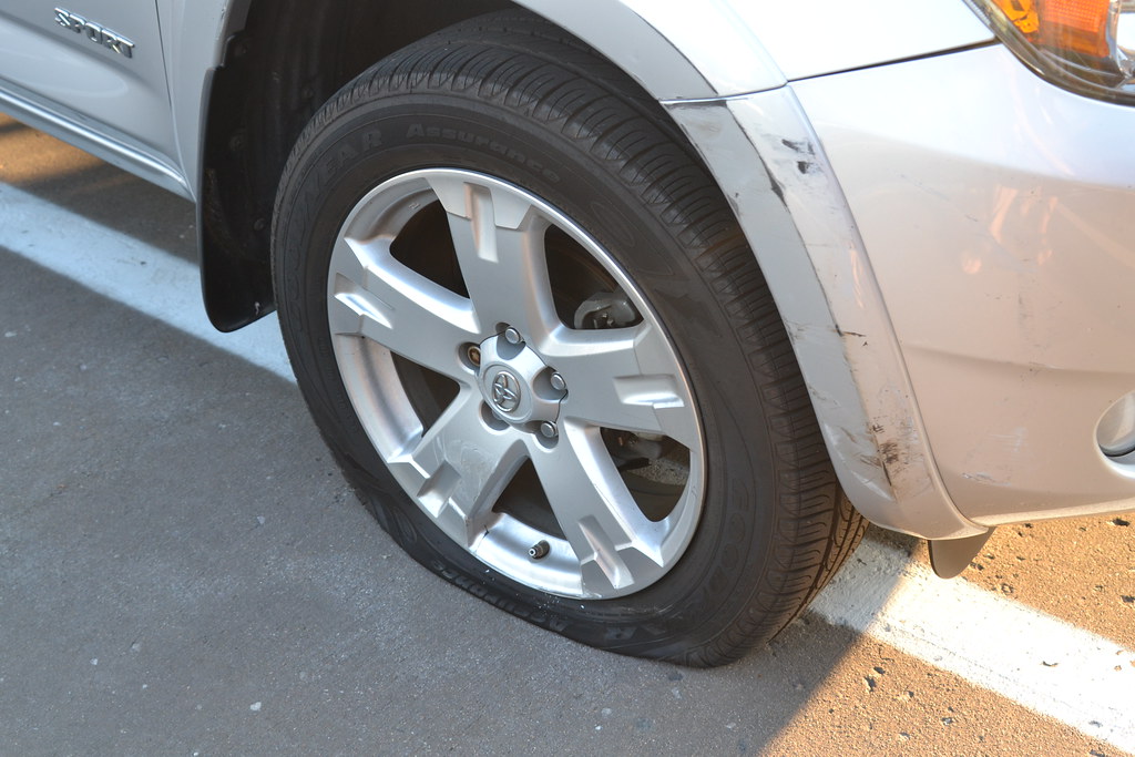 Not Much Damage Snapped the valve stem off the tire and sc… Flickr