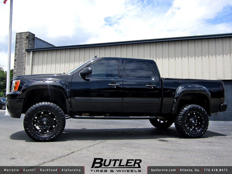 GMC Sierra with 20in Fuel Hostage Wheels, 6in Fabtech Lift, Custom Fuel