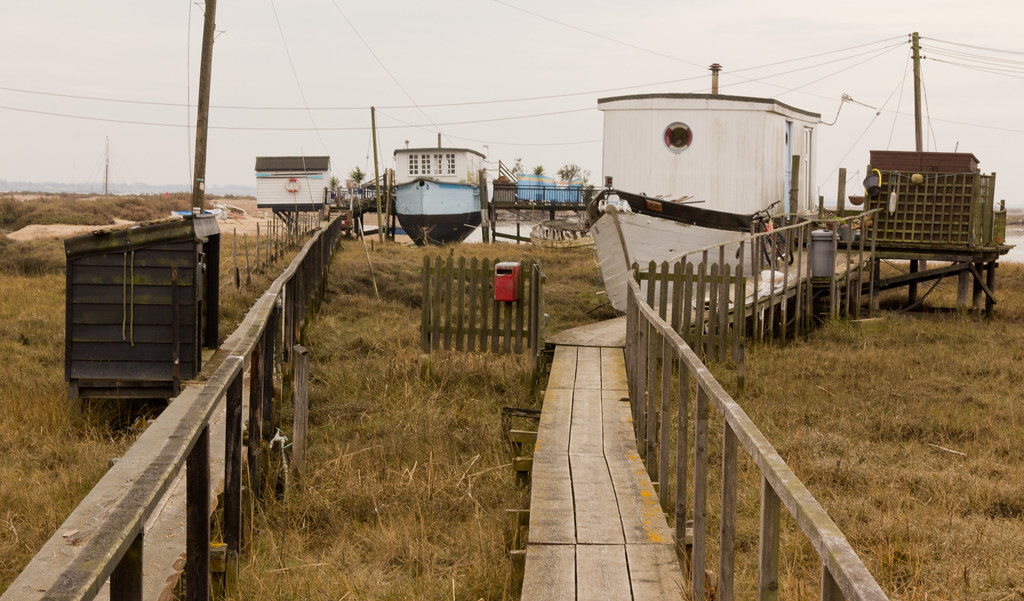 West Mersea Houseboats I Some of the houseboats on the sea… Flickr