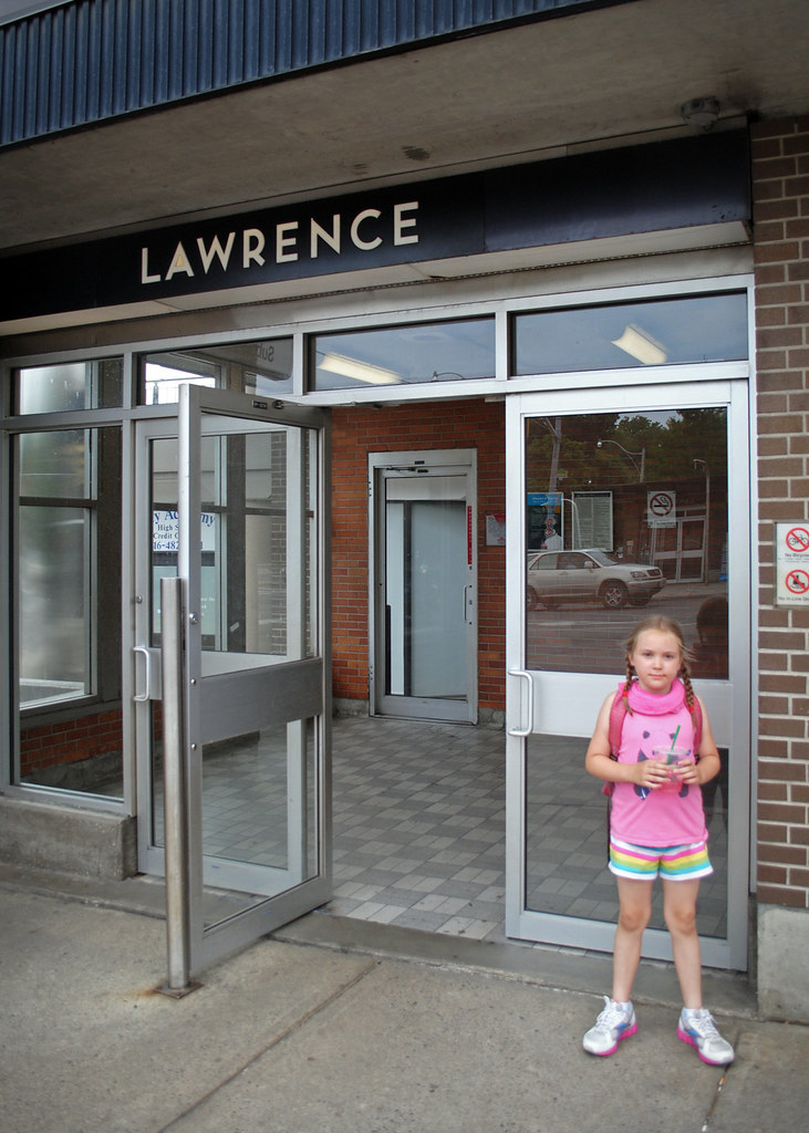 Lawrence Station Clover poses in front of Lawrence Station… Evan