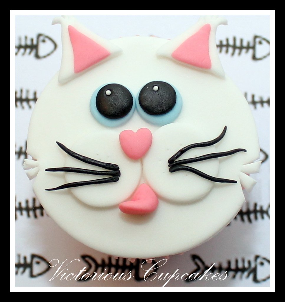 Cat Cupcakes Cupcake Of The Week! Cat looks like it's blow… Flickr