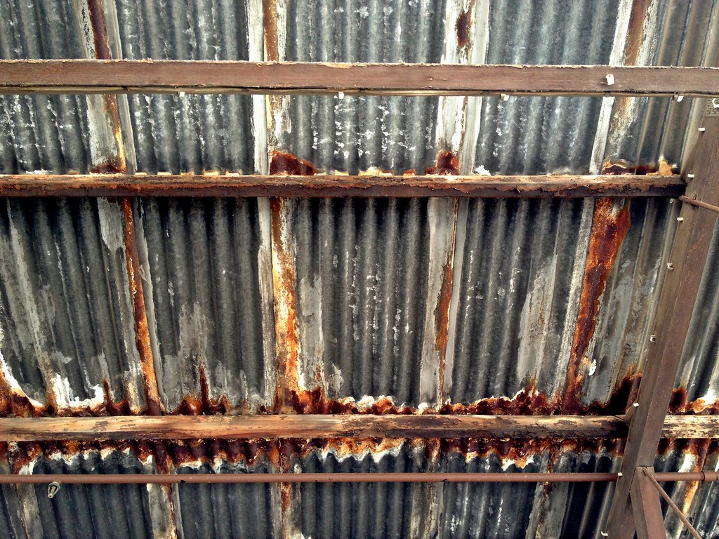 Rusty Roof Rusty corrugated iron roof over an ancient load… Flickr