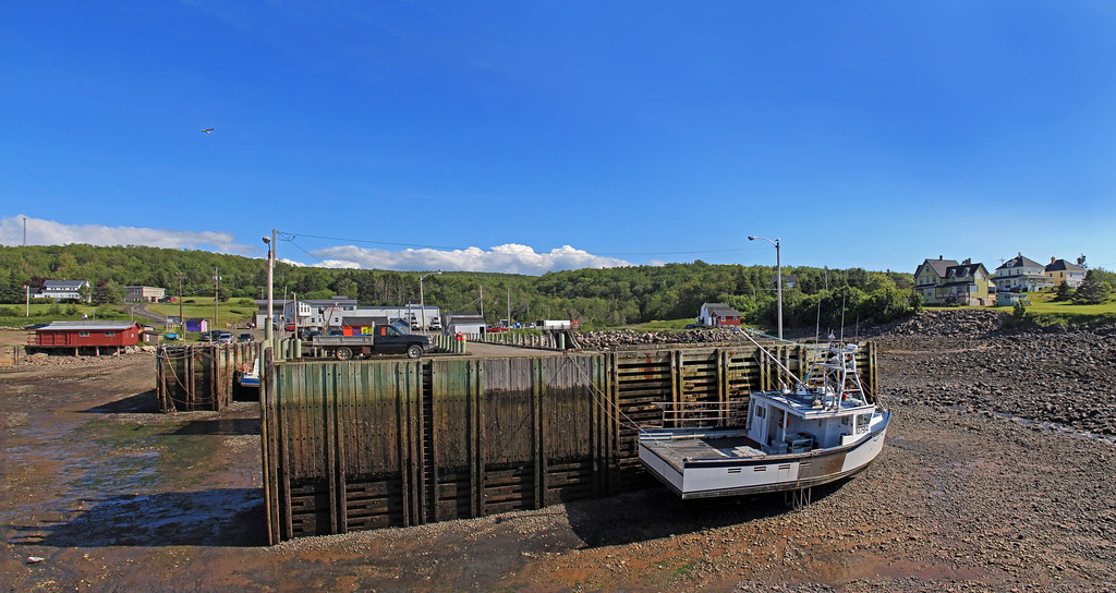 Parker's Cove The wharf at low tide in the Bay of Fundy. T… Flickr