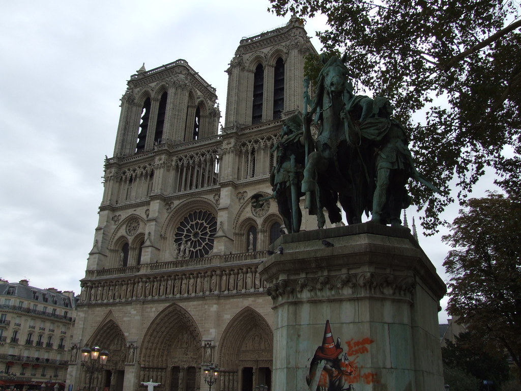 Our Lady and the Emperor Notre Dame and the statue of Char… Flickr