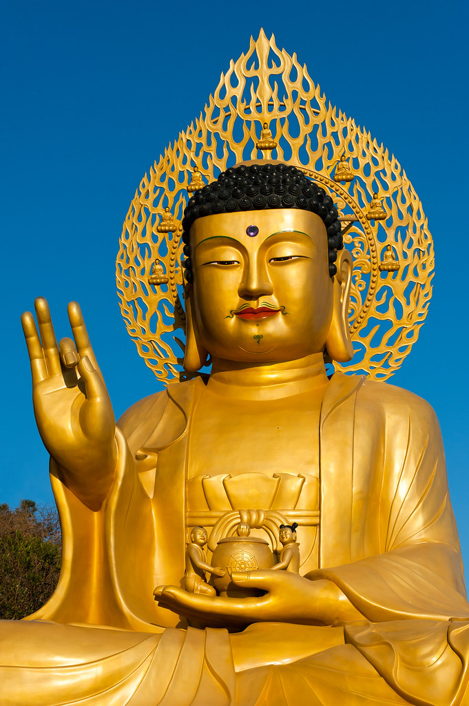 Golden Buddha statue at buddhist temple of Sanbanggulsa at… Flickr