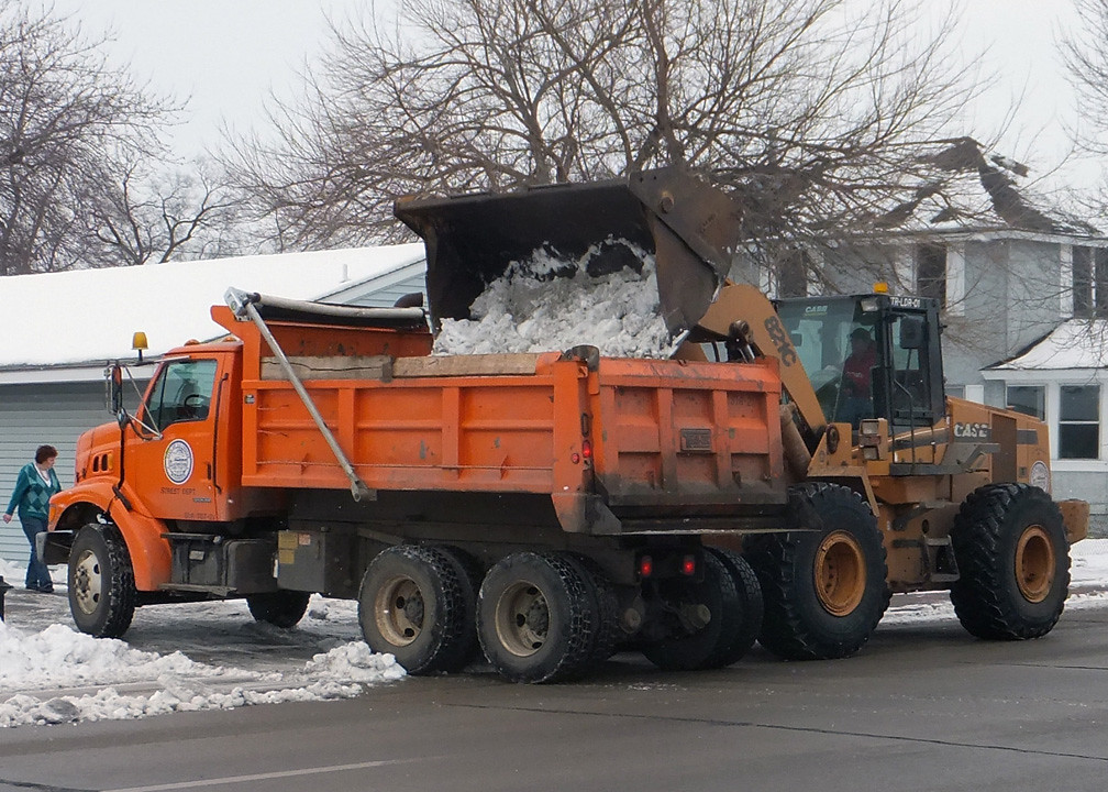 Snow Removal City equipment in the process of removing sno… Flickr