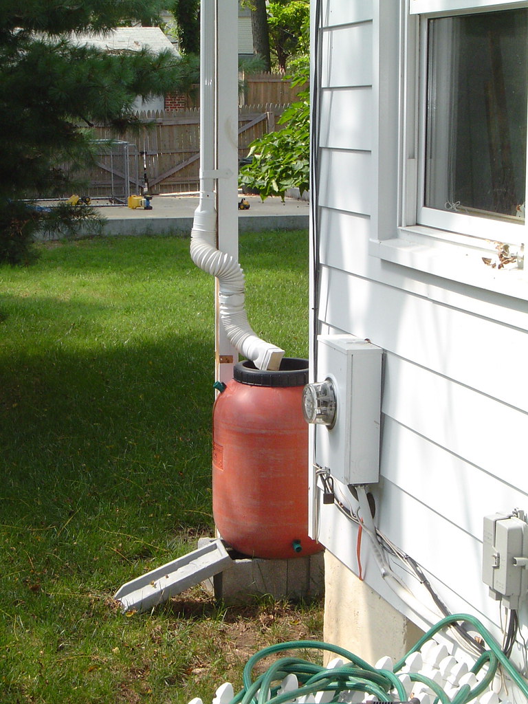 rain barrel with wraparound downspout (credit ACB Jamie … Flickr