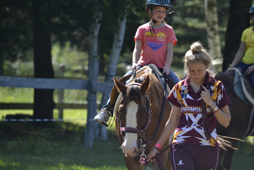 Horse, rider, and counselor at WeHaKee Camp for Girls Flickr
