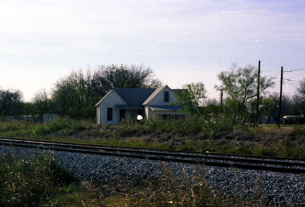 Old house by railroad tracks, 1977. I imagine whoever live… Flickr