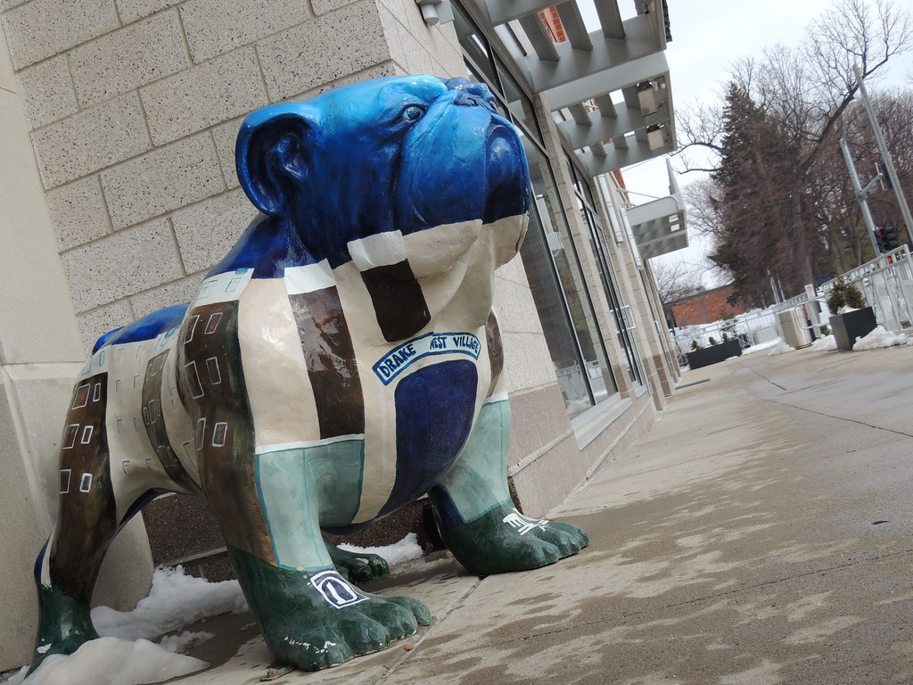 Tilted Village A fiberglass bulldog guards Drake West Vill… Flickr