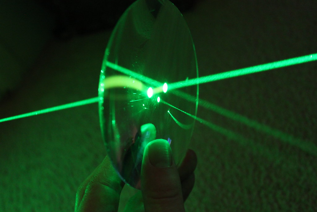 Green laser reflection and refraction 1 Operating powerful… Flickr