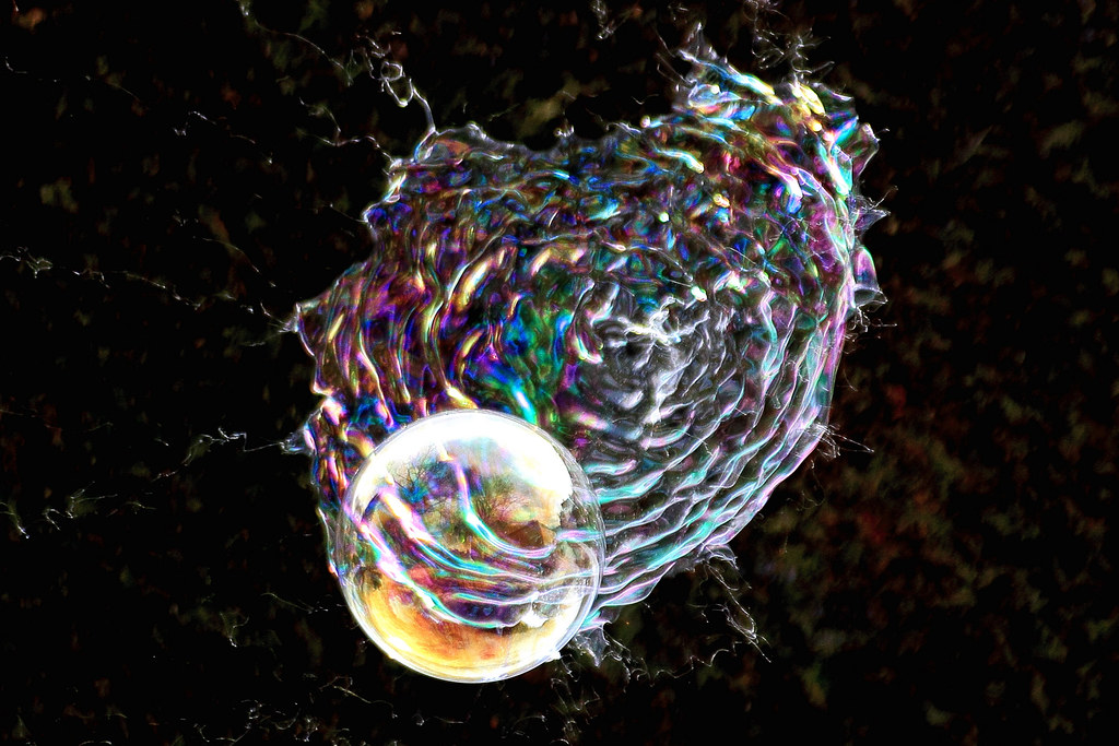 Bursting Bubble A big bubble bursting. There was a smaller… Flickr