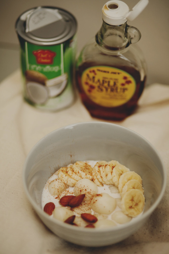 Sticky rice flour balls with coconut milk, banana, almonds… Flickr