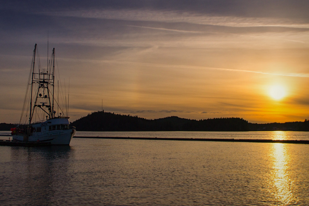 Waterfront sunset Sun setting over Digby Island on the Pri… Flickr
